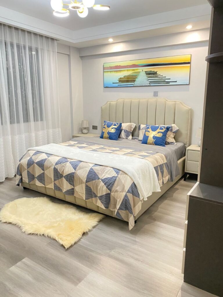 A bedroom at Golden Street 3 bedroom