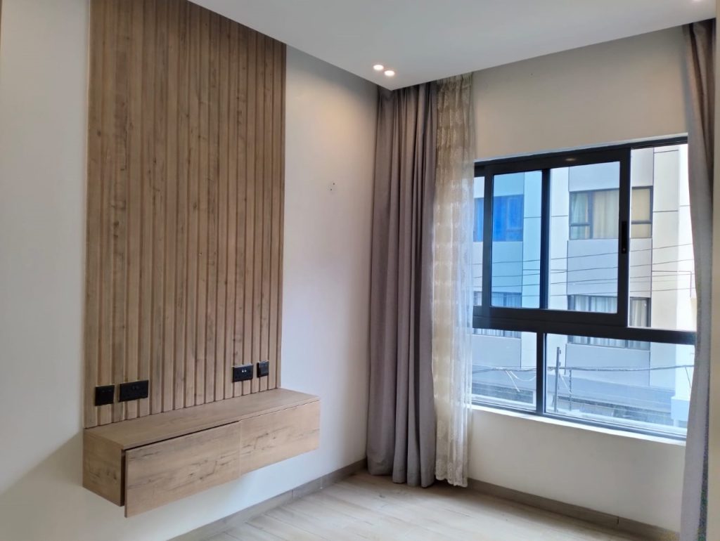 well lit bedroom at Grand Premier Apartment