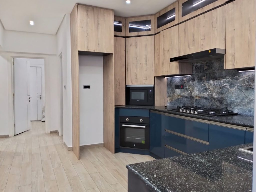 open plan fitted kitchen at Grand Premier Apartment