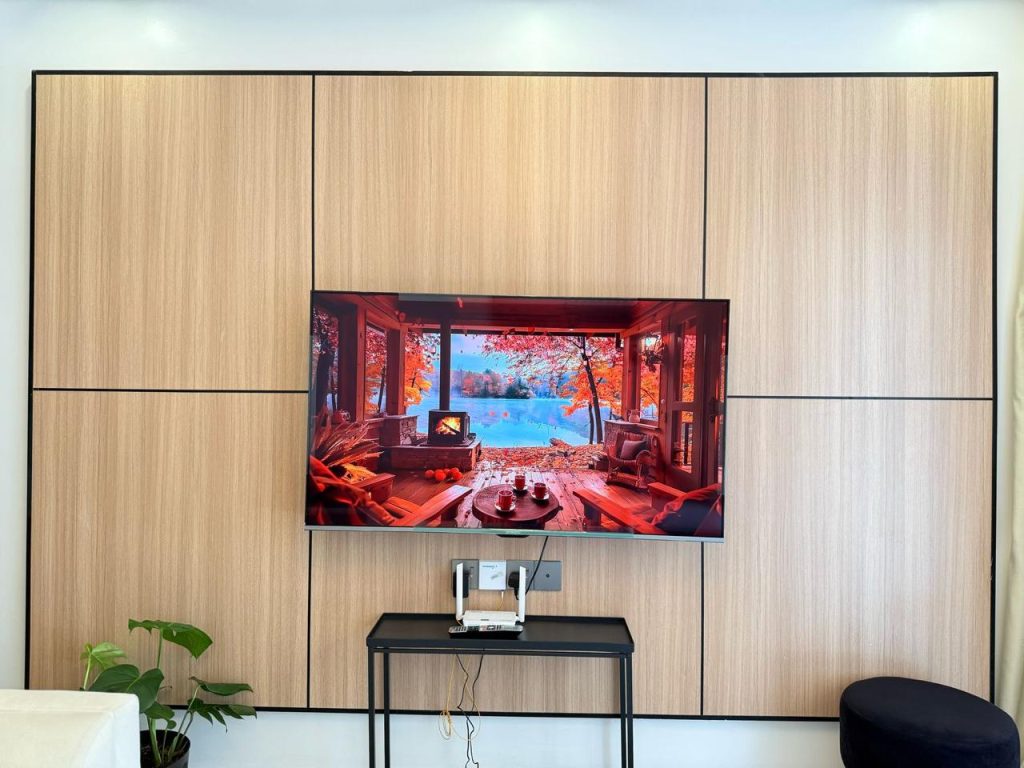 a mounted smart tv with high speed internet connectivty at Furnished Apartment near Netherlands Embassy