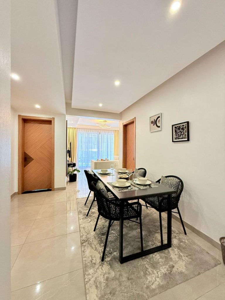 dining table set for four at the Furnished Apartment near Netherlands Embassy