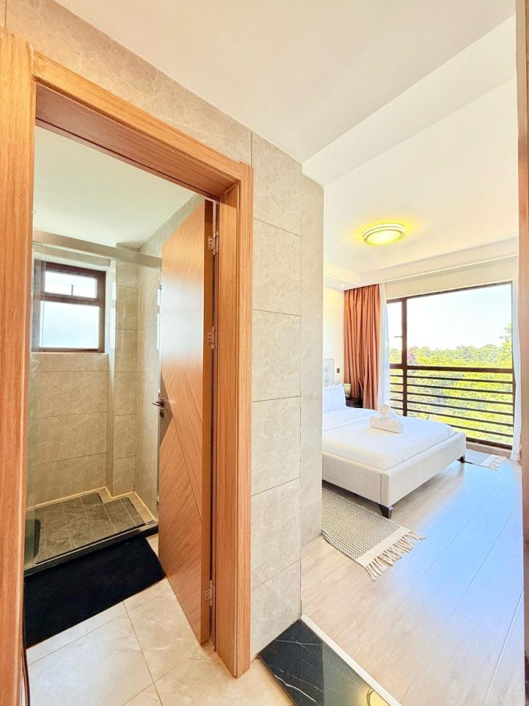 an ensuite bedroom view from the door at the Fully Furnished 3 bedroom Apartment in Westlands