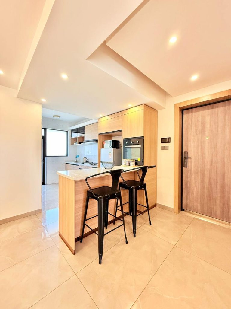a kitchen island at the Fully Furnished 3 bedroom Apartment in Westlands