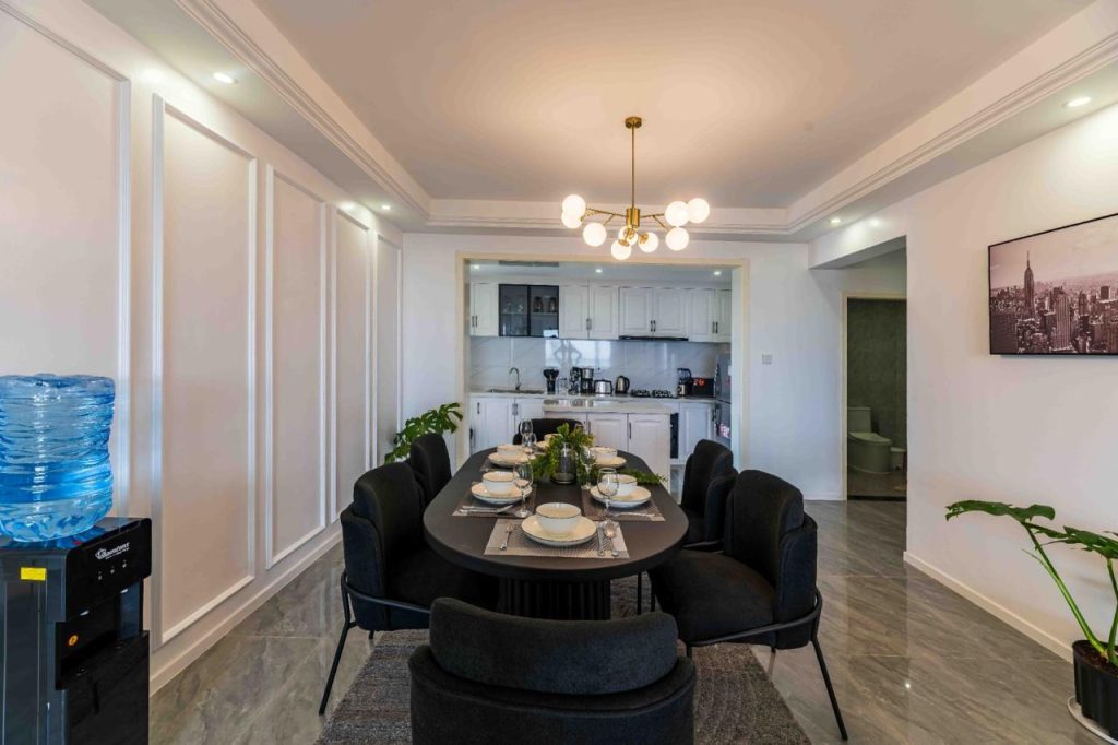 elegant dining areaa set up for five at the Family-friendly serviced apartment in Kilimani