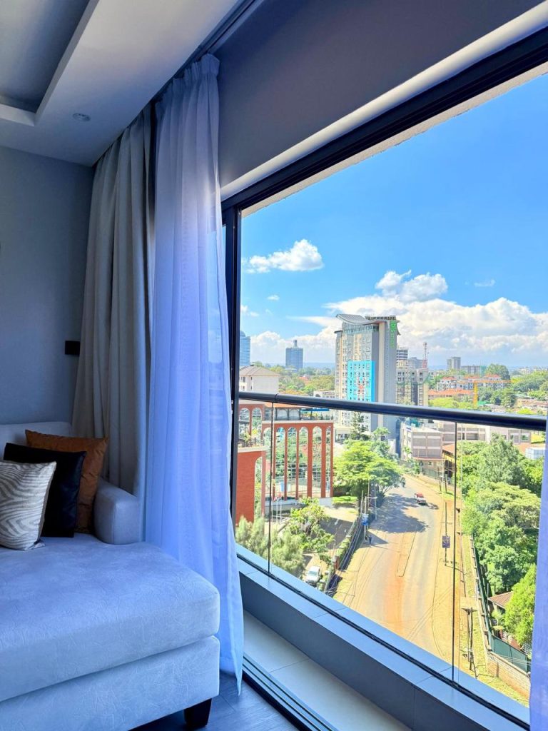 The view from the large windows windows in the living room at Furnished Apartment for Digital Nomads in Nairobi