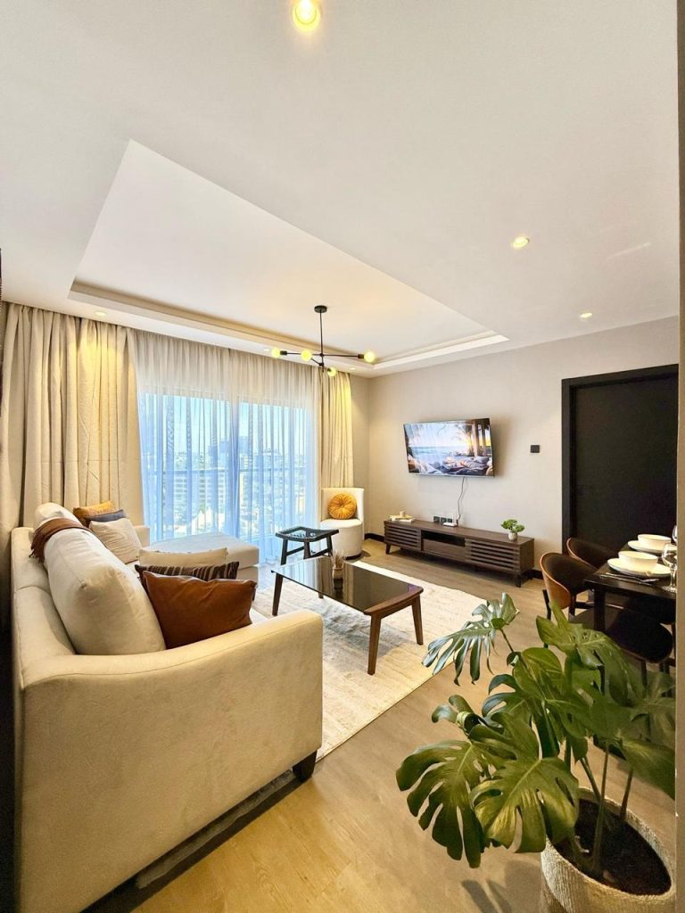 living area at Furnished Apartment for Digital Nomads in Nairobi well lit with Large windows at Furnished Apartment for Digital Nomads in Nairobi