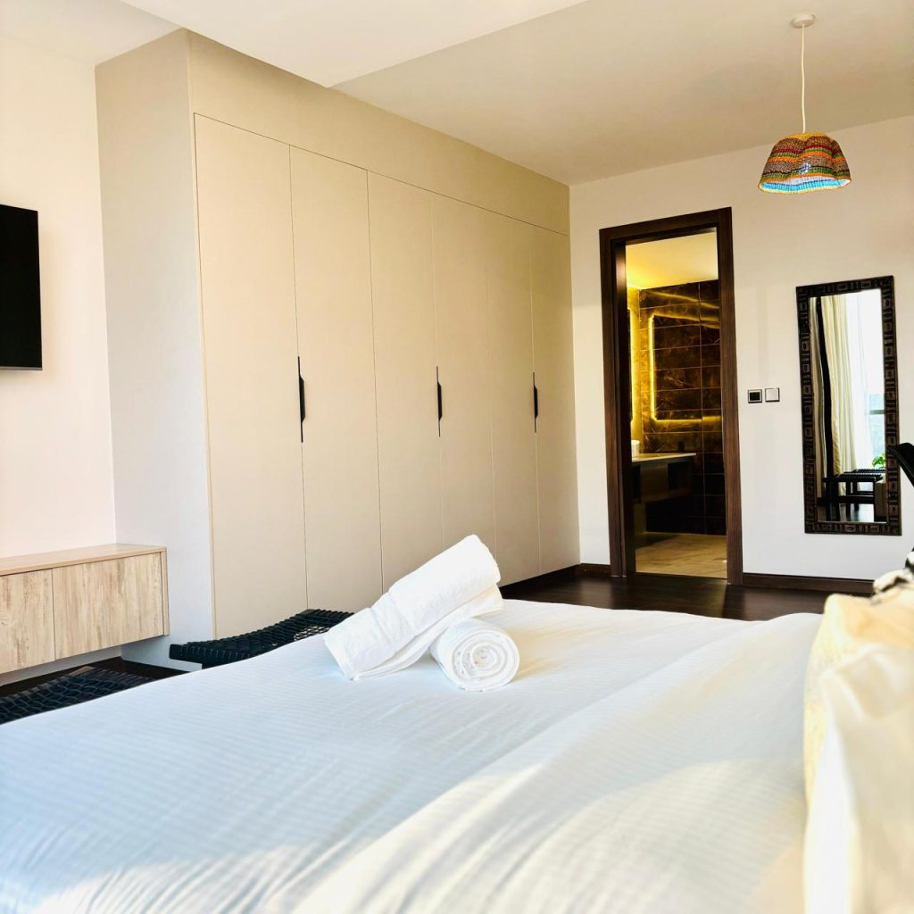 view of an ensuite bedroom with inbuilt wardrobes at Furnished 3 bedroom Apartment in Gated Community