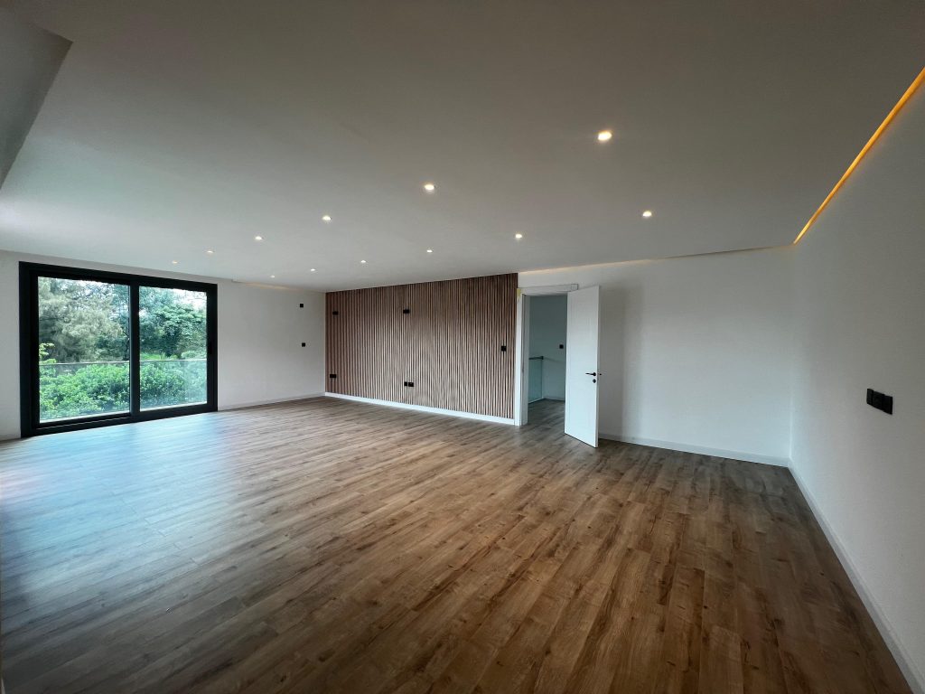 an expansive room with large windows at Five Bedroom Villa in Lavington Nairobi