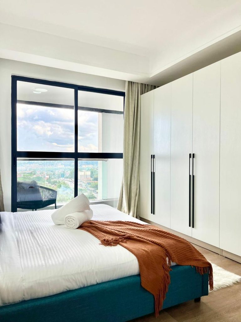 view of the large windows and inbuilt wardrobes at the Two Bedroom Furnished Apartment for rent in Nairobi