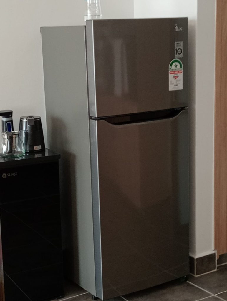 a fridge in the kitchen of the Furnished 2-Bedroom Apartment for Daily Rentals in Kilimani