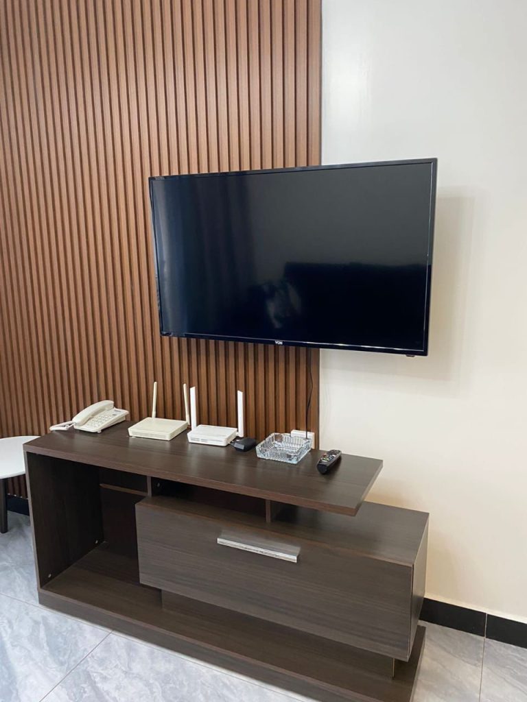 mounted smart tv at Furnished 1 bed apartment near Kilimani mall