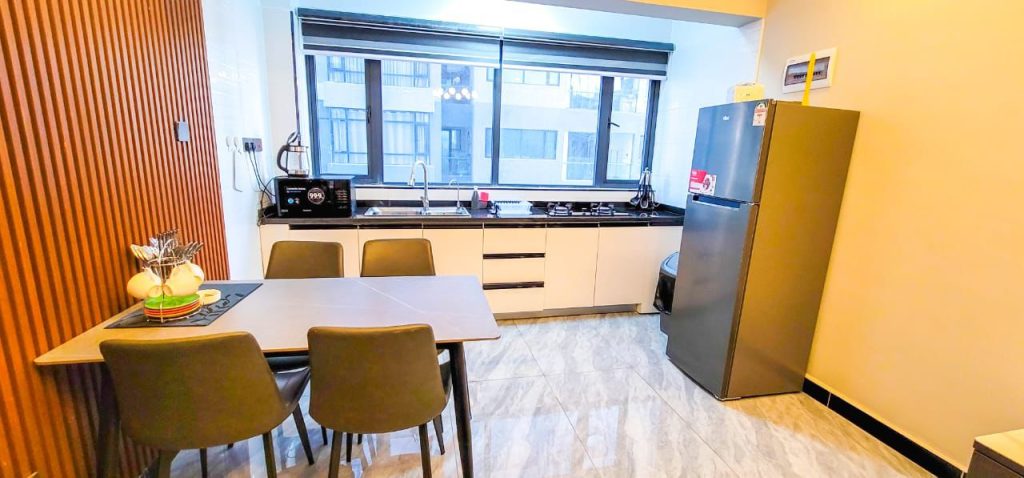 open plan kitchen at Luxury 1 bedroom apartment near Yaya Kilimani