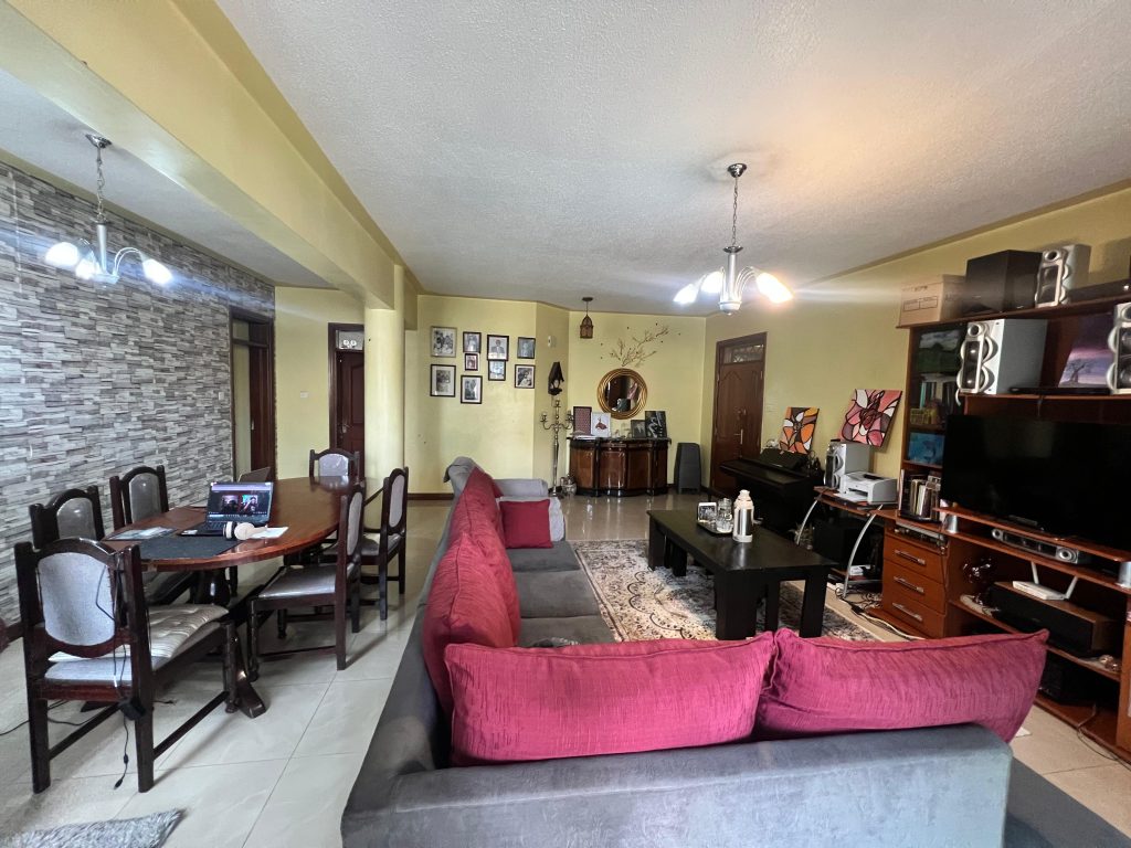 view of a bright lounge at the 3 bedroom apartment at White Oak Park