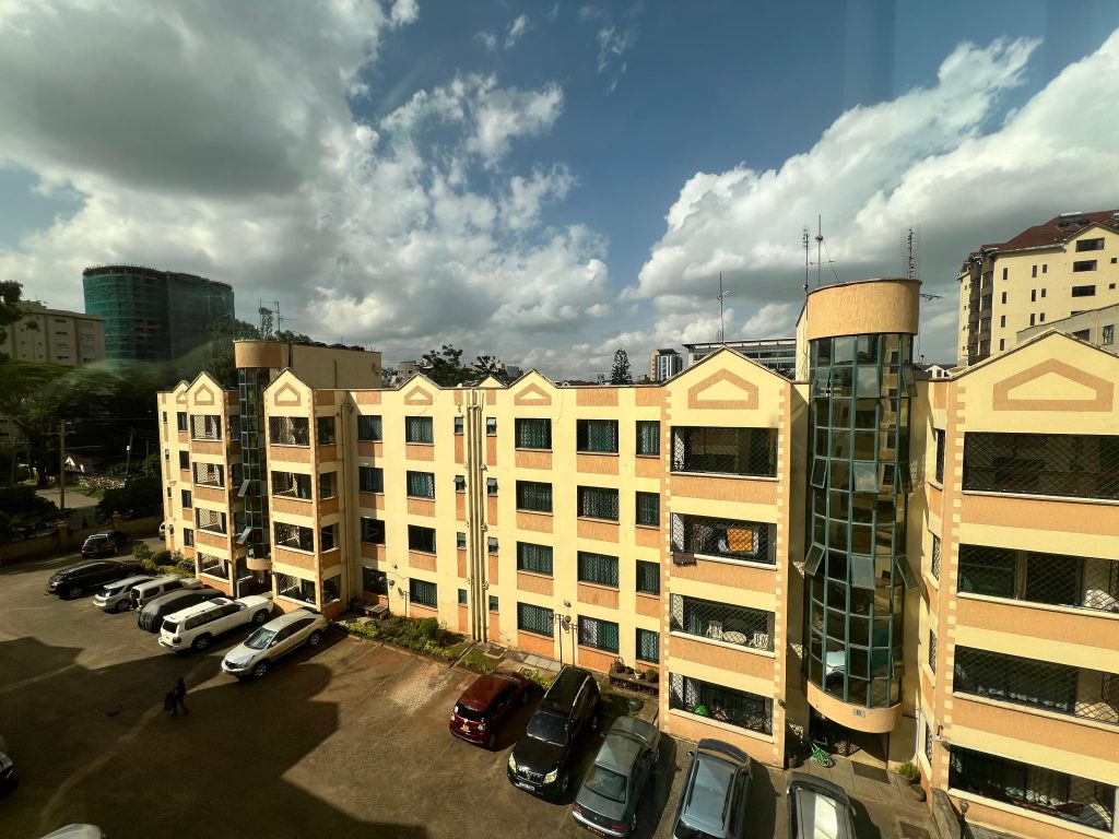 the building of the White Oak Park Apartments in Kilimani and the parking area View from a far