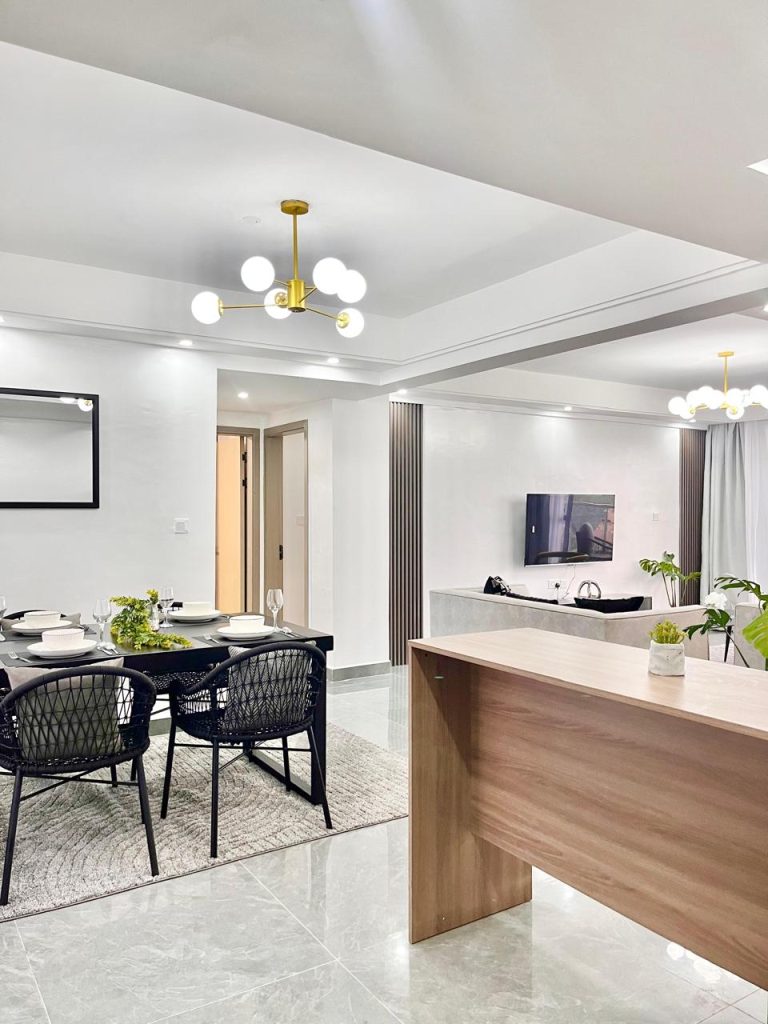 partial view of the dining area and the living area at the Short-Term Accomodation Furnished Apartment in Westlands
