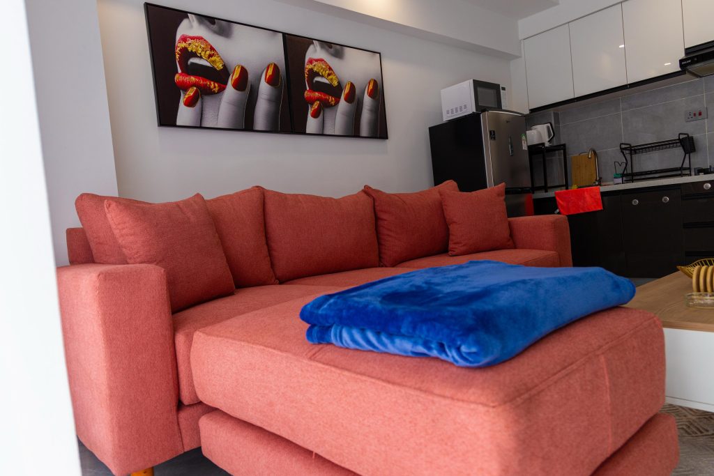 a large couch at 1 bedroom furnished apartment in Lavington