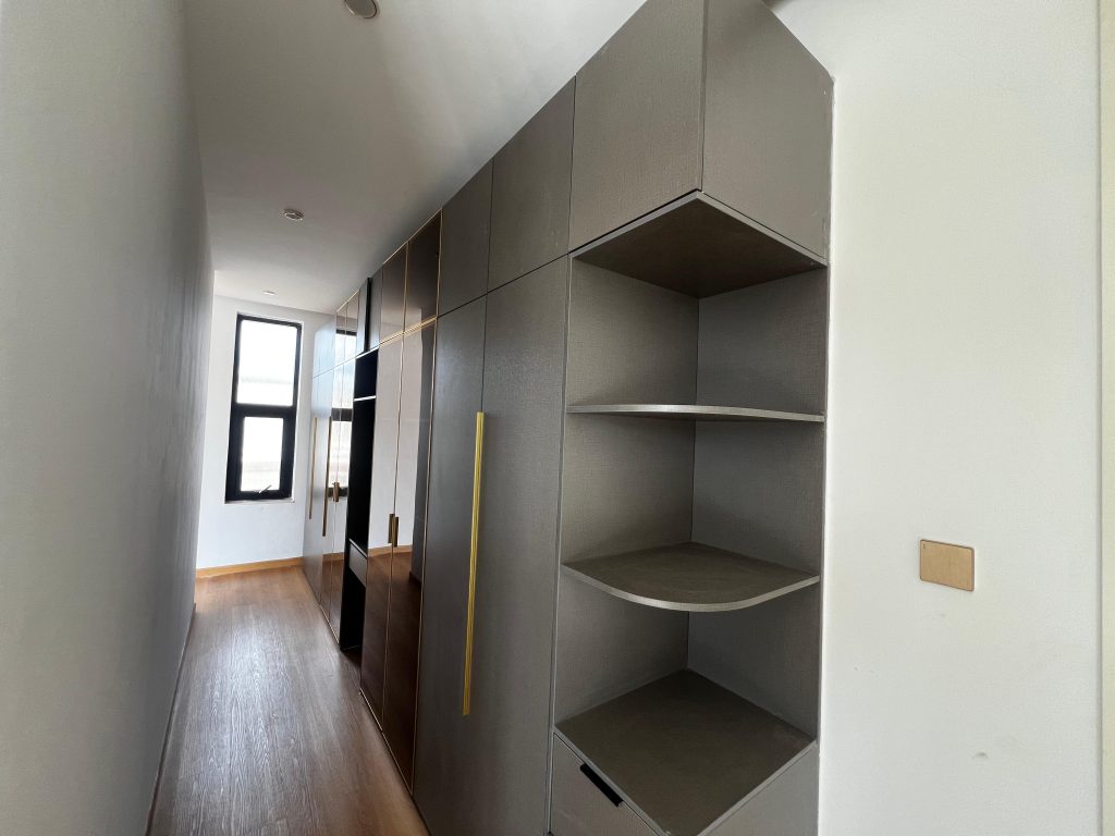 a walk in closet at Five Bedroom Townhouses in Lavington