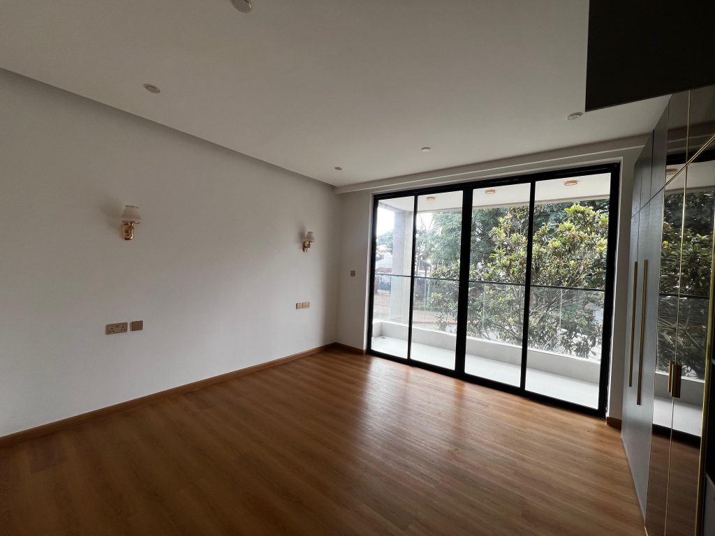 well lit bedroom at Five Bedroom Townhouses in Lavington