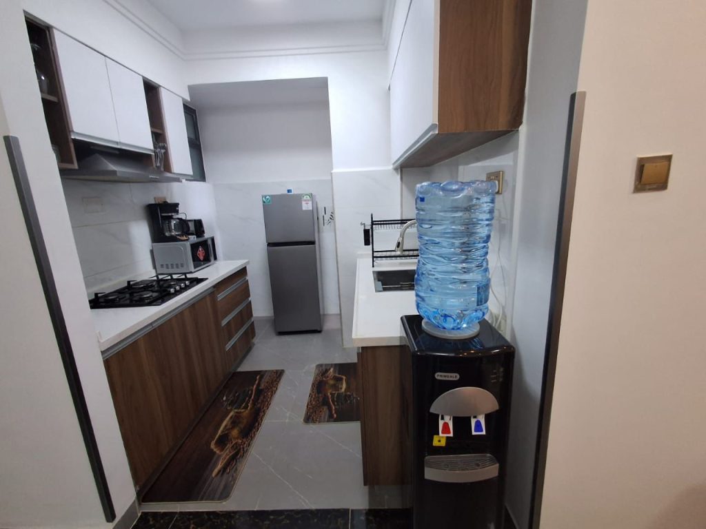 fitted open plan kitchen at Luxury Furnished 1 Bedroom Apartment in Lavington