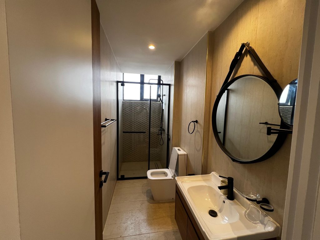 Bathroom with cubicle glass shower at Serviced Apartment Group Accommodation in Nairobi