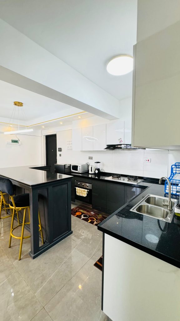 large open plan kitchen of the Furnished 2 Bedroom Apartment Master Ensuite in Kileleshwa