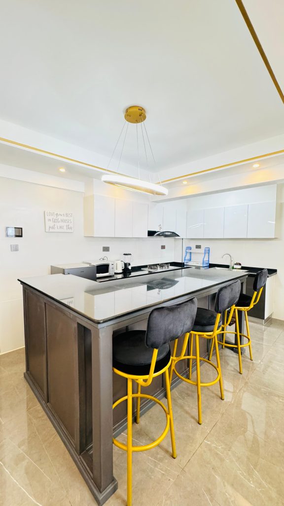 kitchen island seating for the Furnished 2 Bedroom Apartment Master Ensuite in Kileleshwa