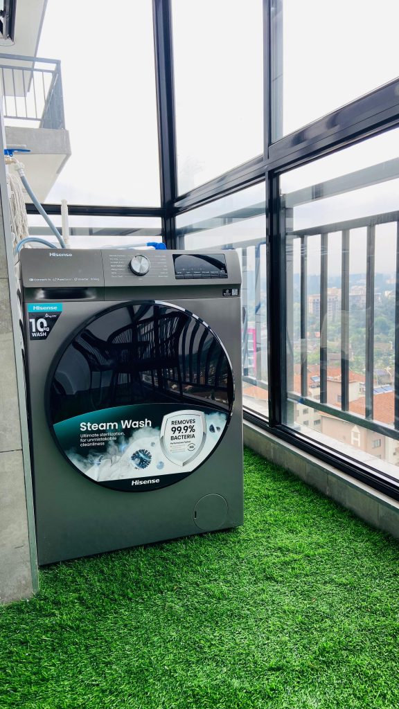 washing machine at the Furnished 2 Bedroom Apartment Master Ensuite in Kileleshwa