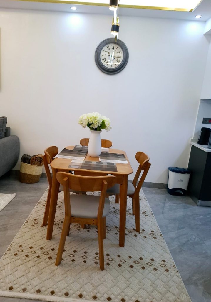 Elegant dining area setup in 2 Bedroom Corporate Housing in Kilimani Nairobi ideal for corporate guests.