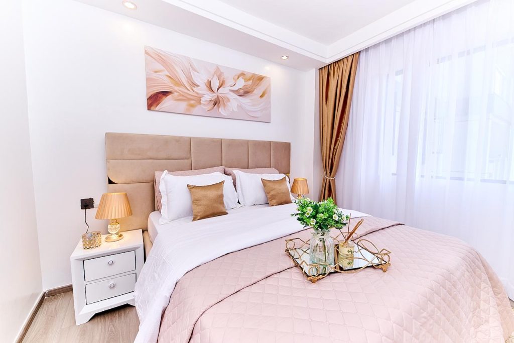 Queen size bed at Spacious one bedroom in pay per night apartment in Lavington Nairobi