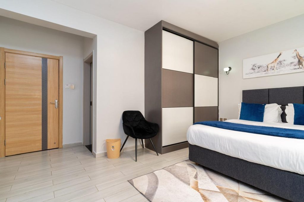 Inbuilt wardrobe in the bedroom of a furnished apartment in Kileleshwa for rent.