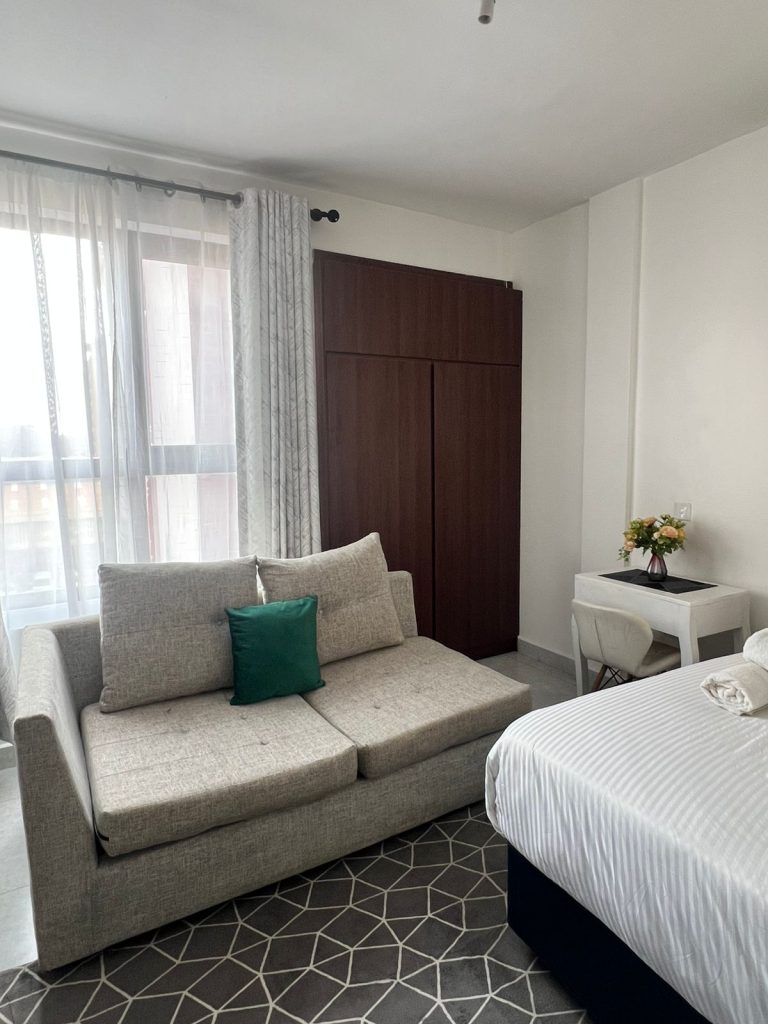 2 seater couching inside the Furnished Apartment Under 100k per Month in Nairobi