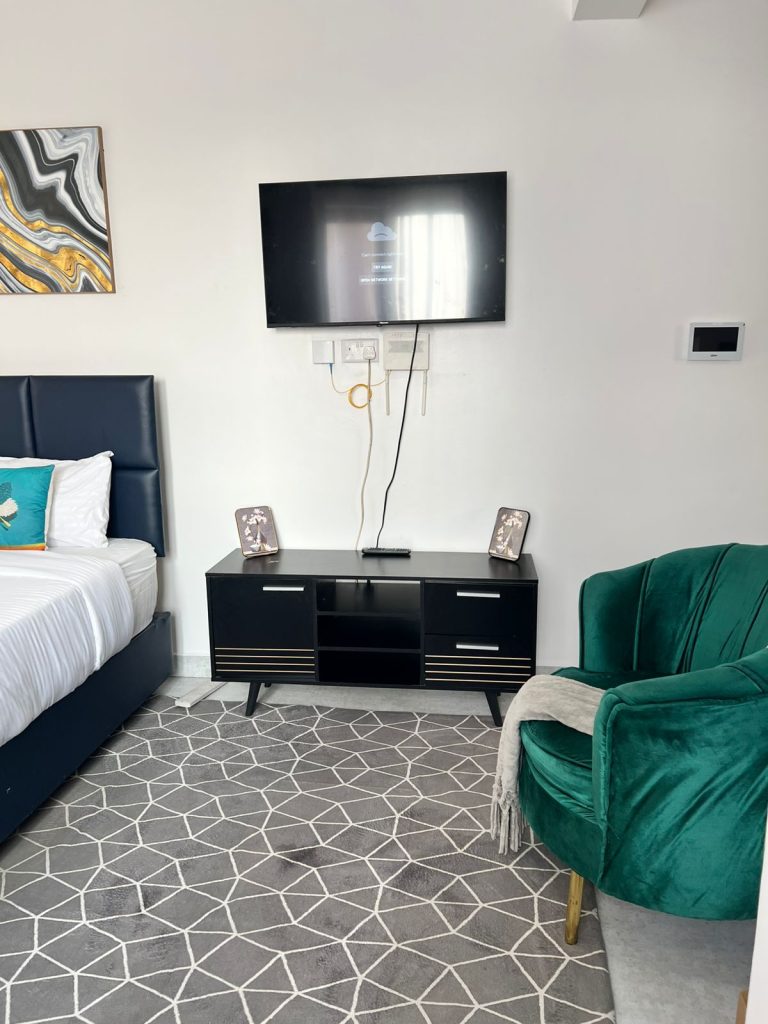 flat screen smart tv inside the Furnished Apartment Under 100k per Month in Nairobi