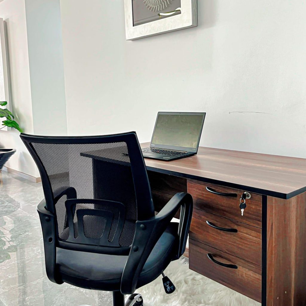 Dedicated working area with a desk and ergonomic chair – Furnished Apartment for Short Stays in Nairobi.