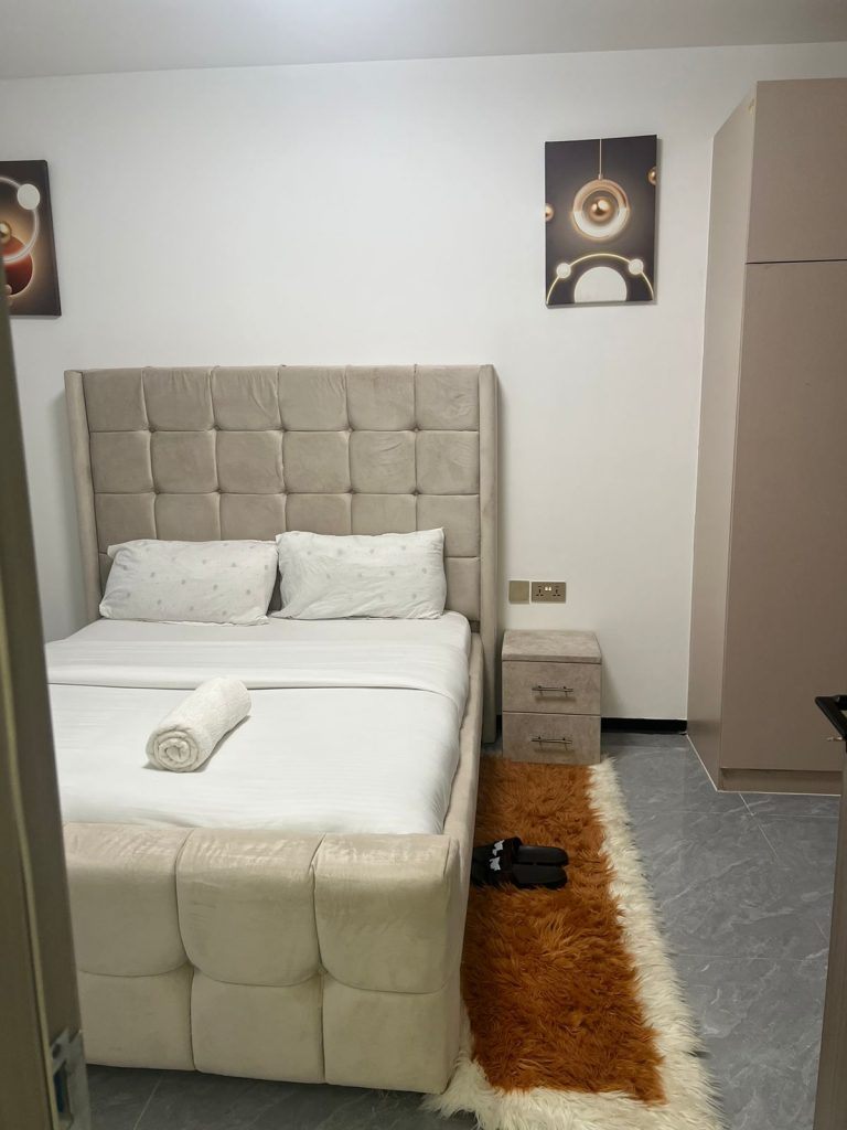 Comfortable queen size bed at Serviced Apartment for Foreigners in Nairobi