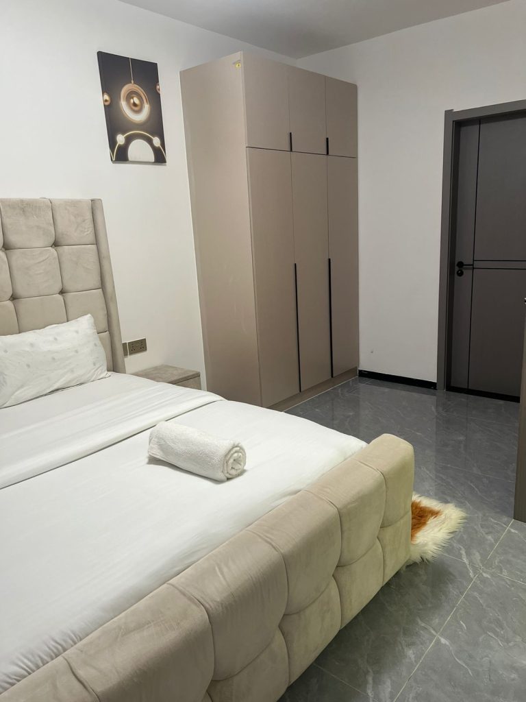 Bedroom with fitted wardrobe in Serviced Apartment for Foreigners in Nairobi