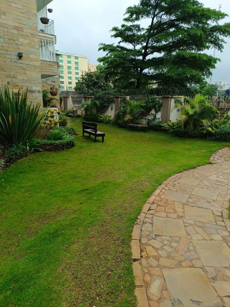 Green garden space within the compound of a furnished duplex apartment for short stay in Kilimani