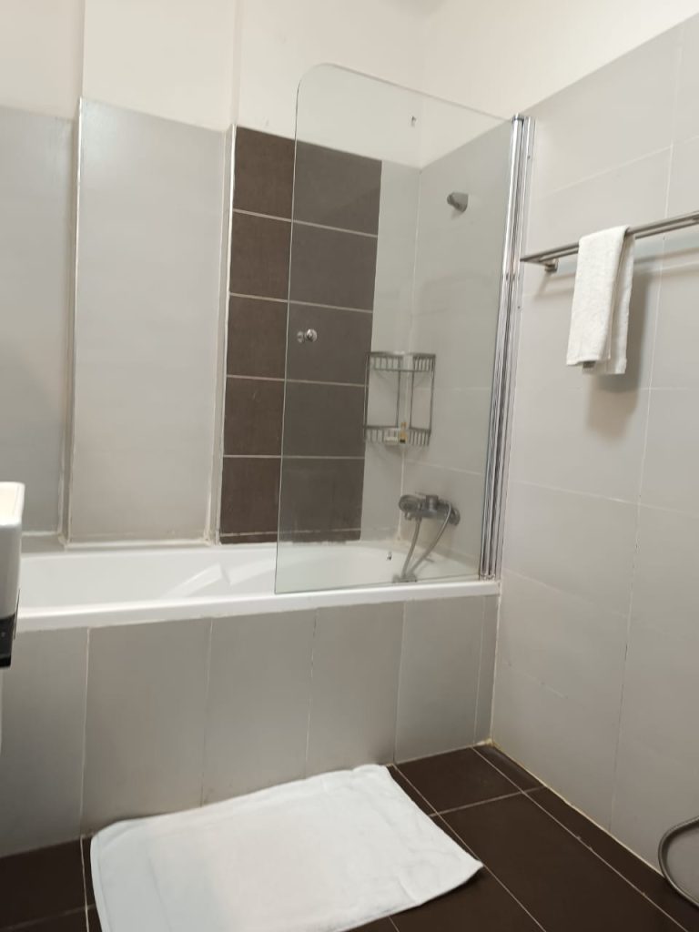 Bathtub inside a luxury Serviced 2 Bedroom Duplex Apartment in Nairobi
