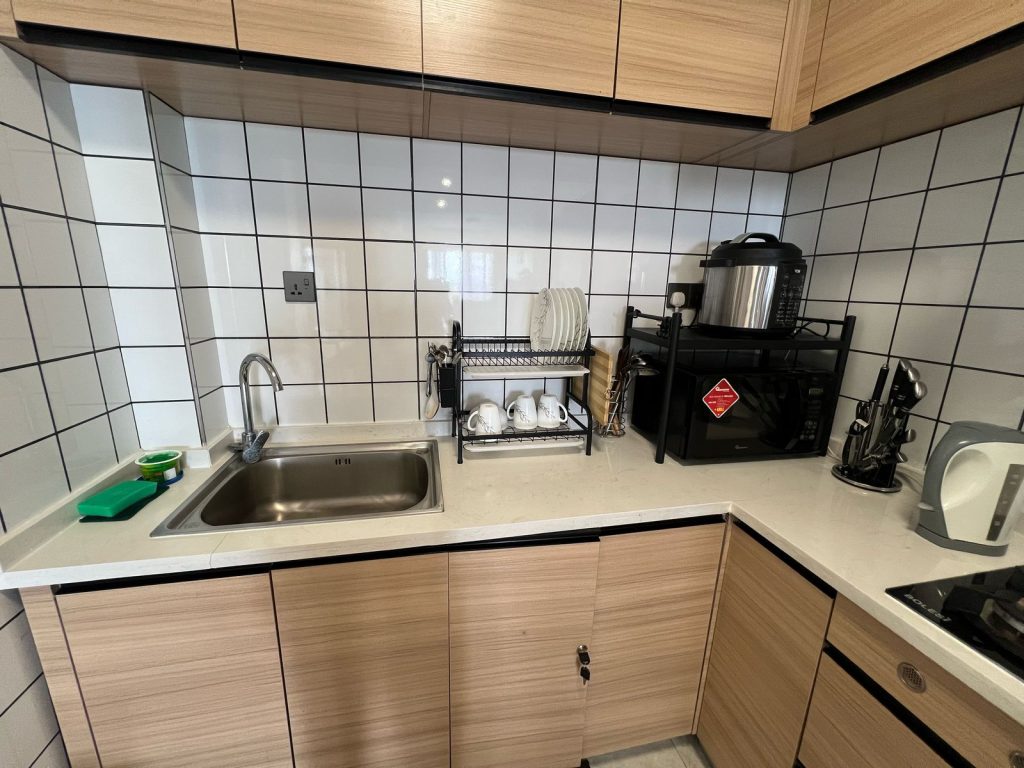 Stylish open plan kitchen in Ruaka furnished daily and monthly rental in Nairobi equipped with modern appliances.
