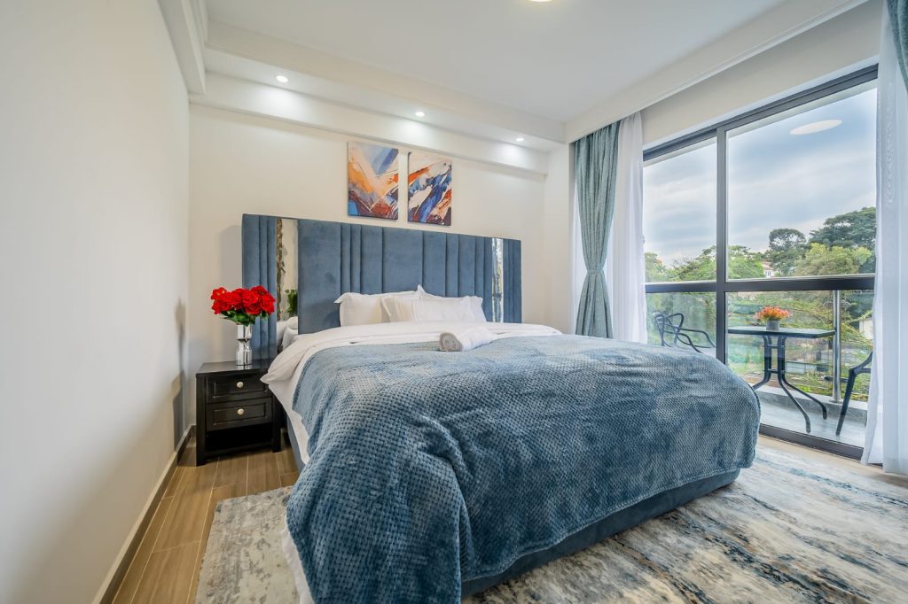 king size comfortable bed with warm beddings at sheva suites