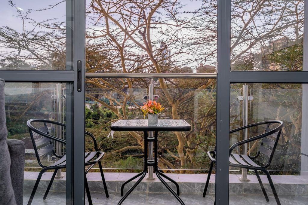view of the balcony from the large windows at shave suites