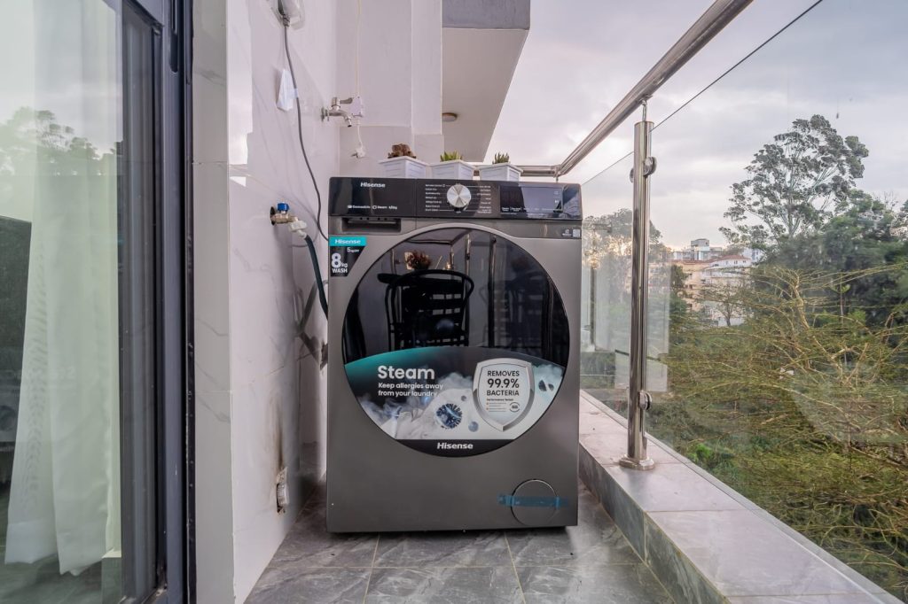 washing machine at sheva suites for convenience