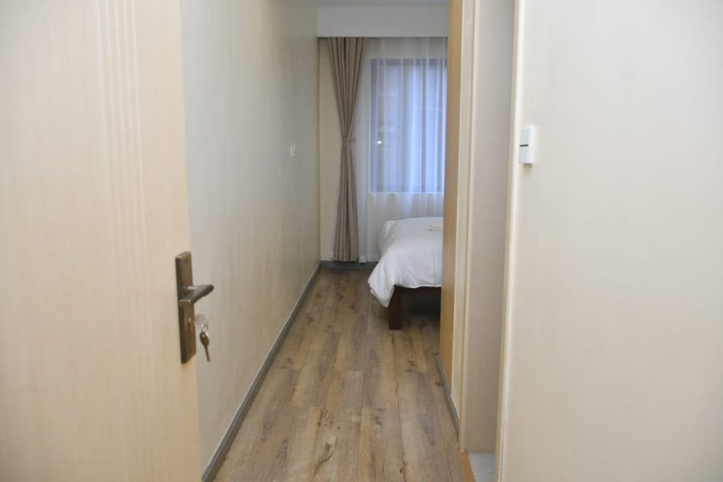 Entry into the bedroom at the Executive Furnished Apartment In Kileleshwa Nairobi