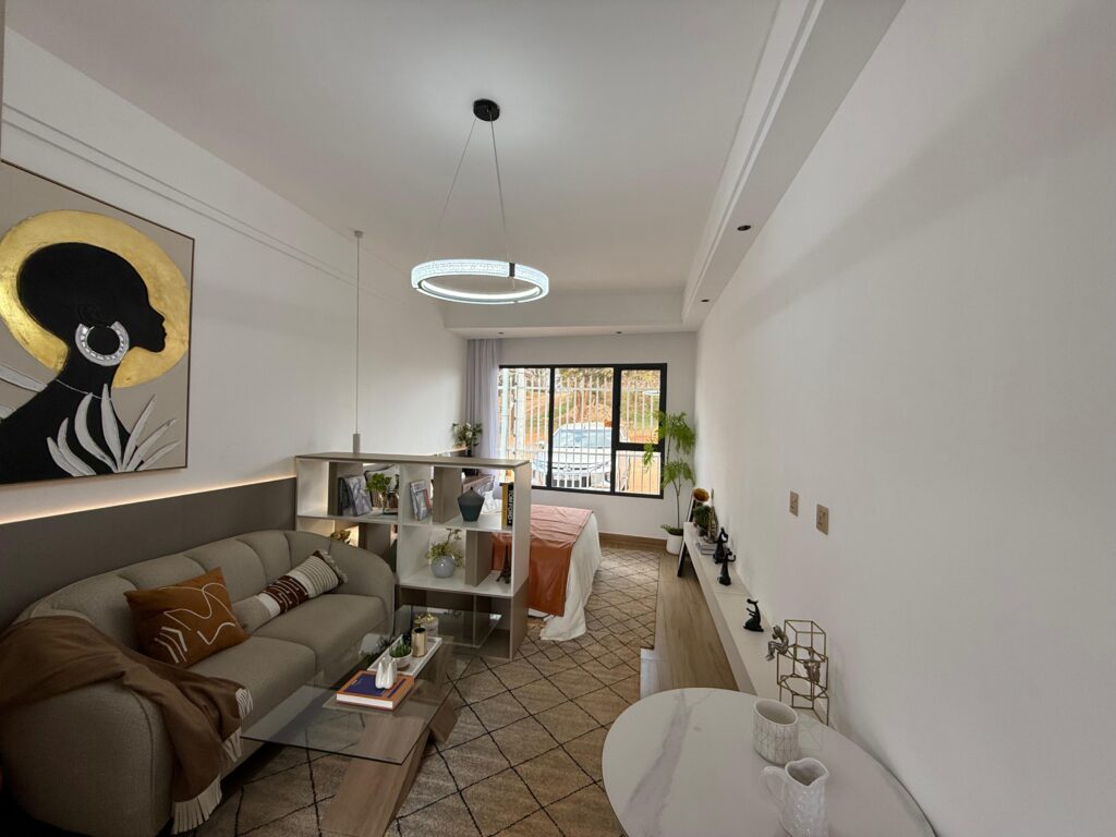 the whole view of the studio apartment at Astra Bay with Large windows