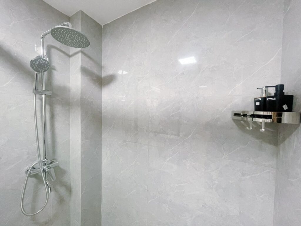a fancy shower and provisions at Furnished apartment on riara road