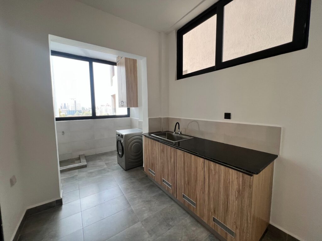 An Expansive laundry area at Silver Decks Apartment