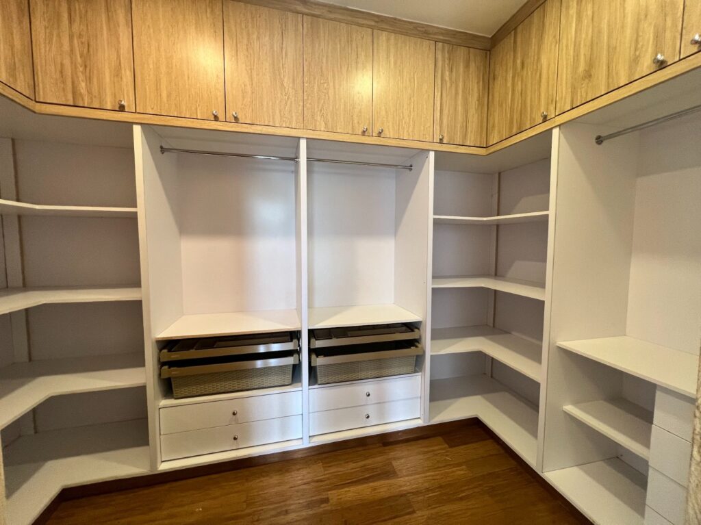 The master bedroom walk in closet at Silver Decks Apartment