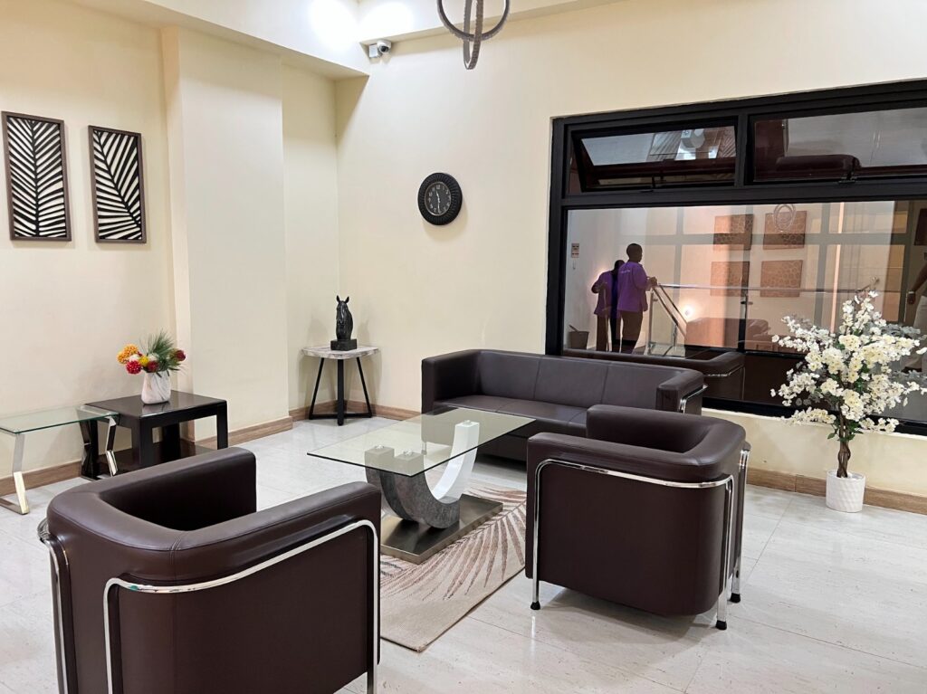 Bright living room with large windows at silver Decks Apartment