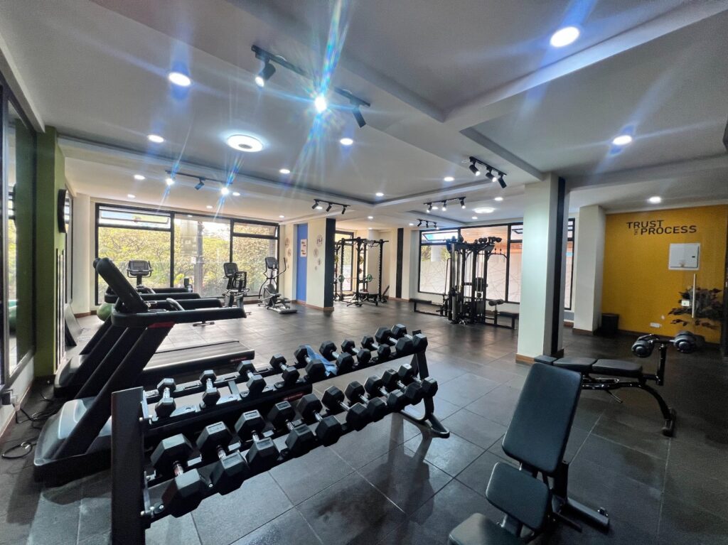 A fully equipped gym at Silver Decks Apartment