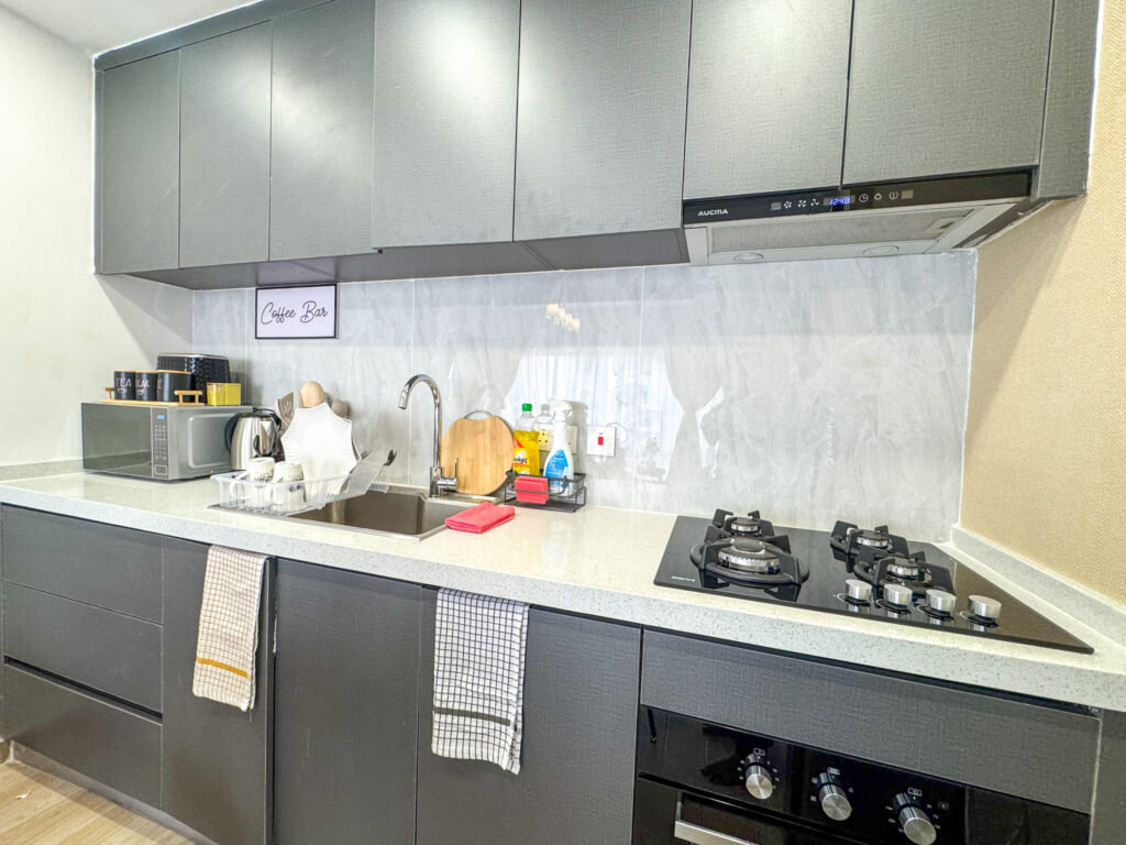open plan kitched fitted with appliances at furnished apartment at southpark apartment