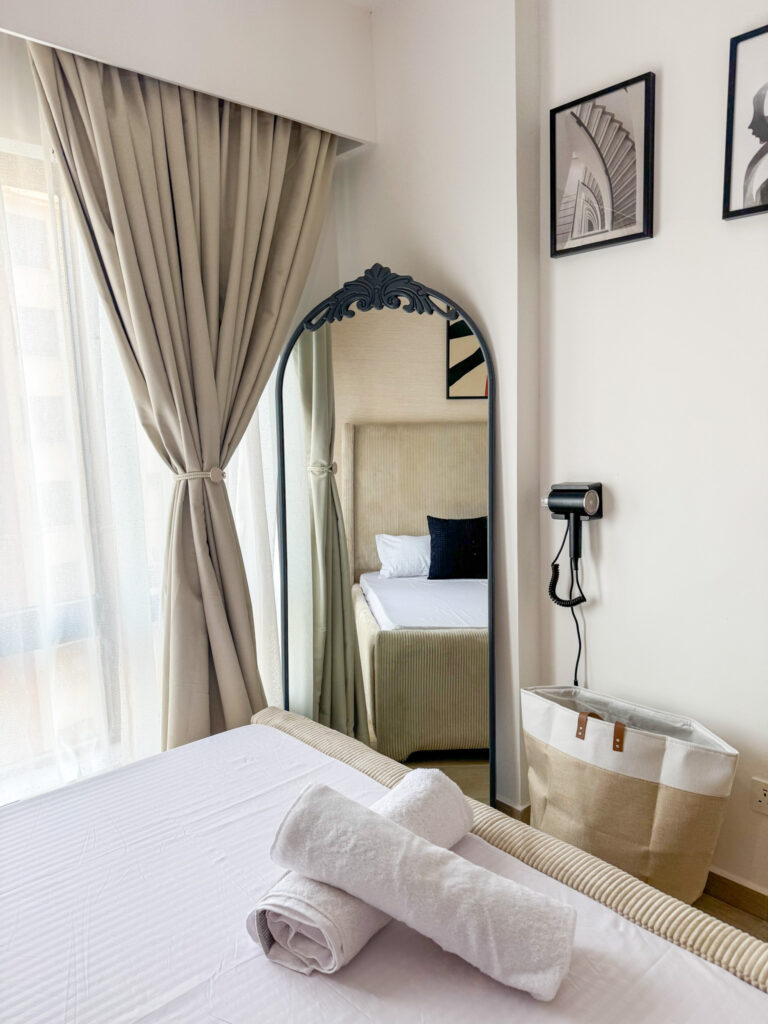 a classic wirror in a bedroom at furnished apartment at southpark apartment